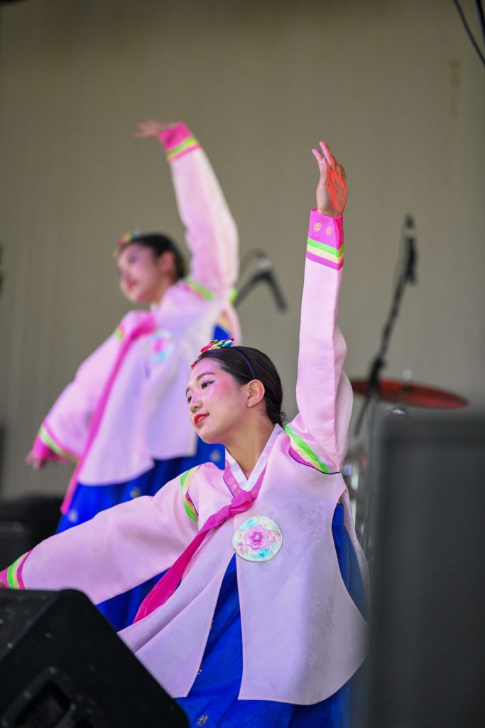 Dancers in Korean costume dance at the 2023 Belleville Waterfront and Multicultural Festival.